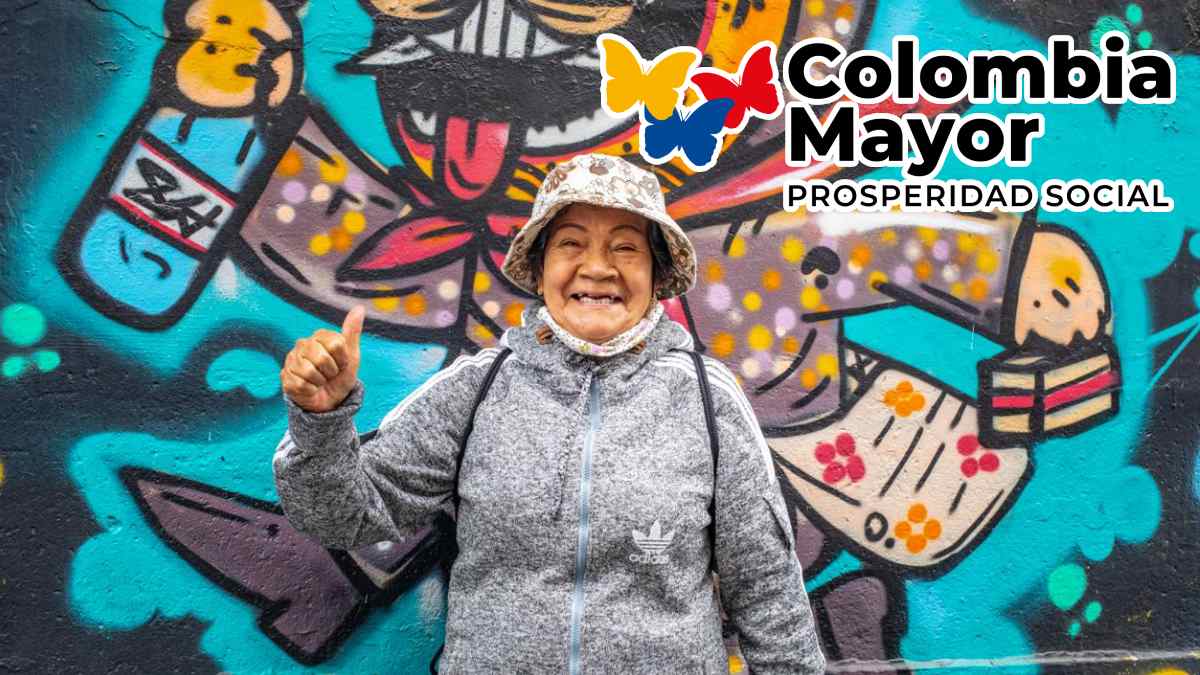 Pago Colombia Mayor 2024-MP Noticias, imagen de mujer de la tercera edad alegre, logo de Colombia mayor